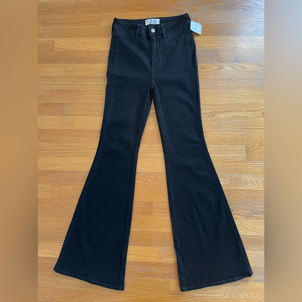 We The Free by Free People High-Waisted Flare Jeans in Black